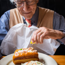 Older man having a meal