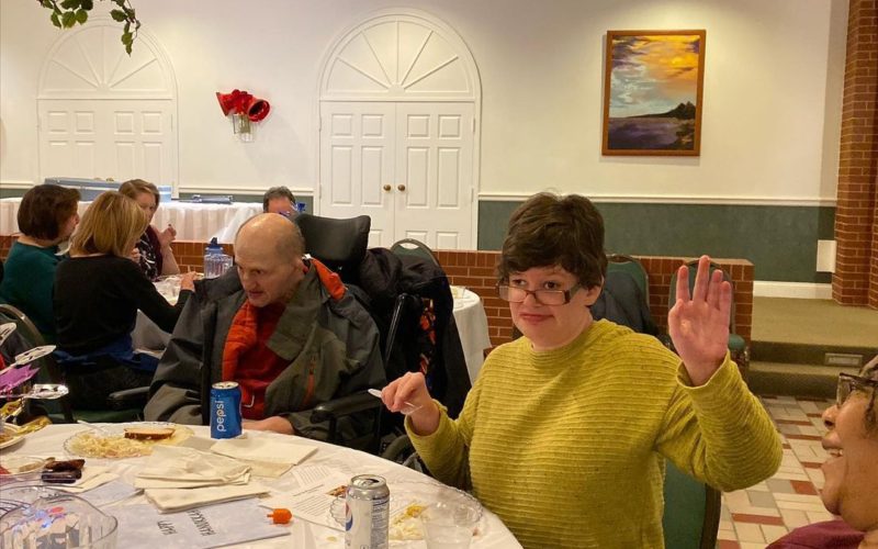 Holiday celebration. Groups of people at tables