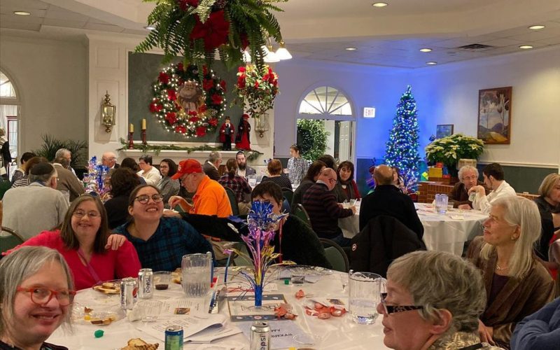 Holiday celebration. Groups of people at tables