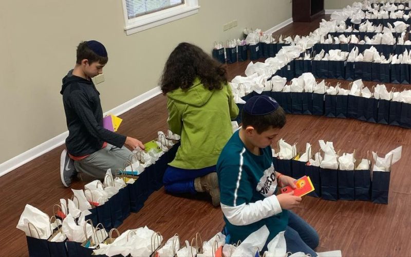 Volunteers with bags to donate