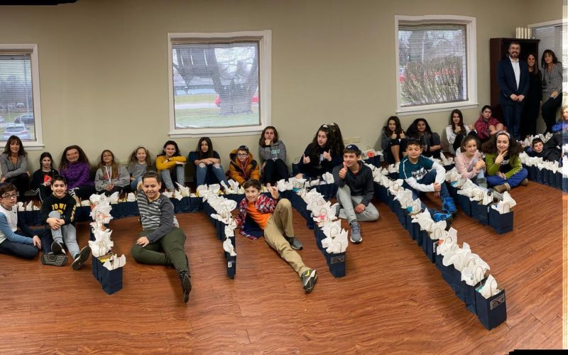 Volunteers with bags to donate