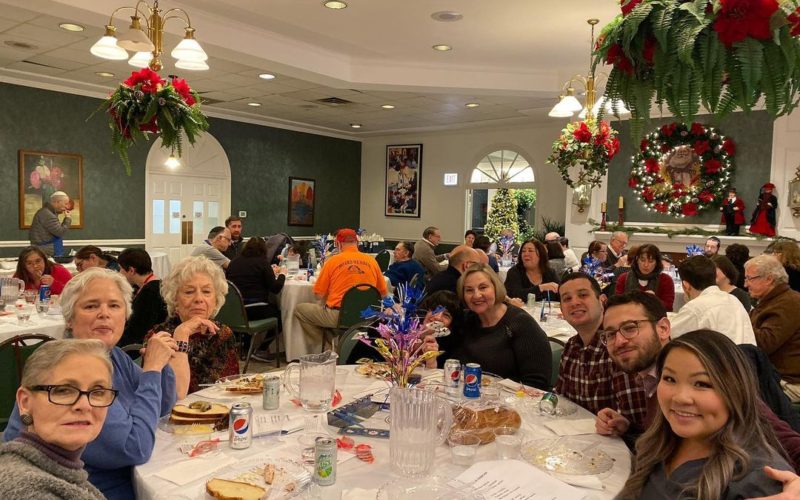 Holiday celebration. Groups of people at tables