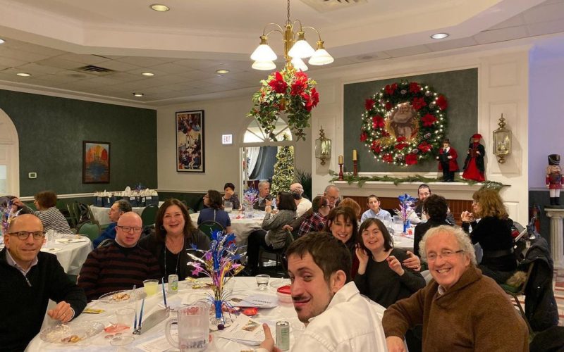 Holiday celebration. Groups of people at tables