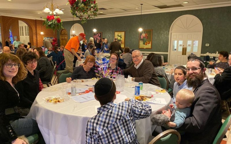 Holiday celebration. Groups of people at tables