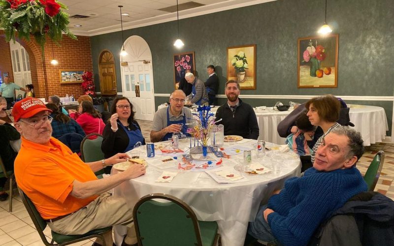 Holiday celebration. Groups of people at tables