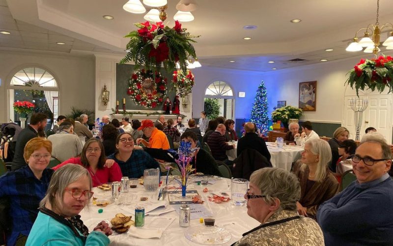 Holiday celebration. Groups of people at tables