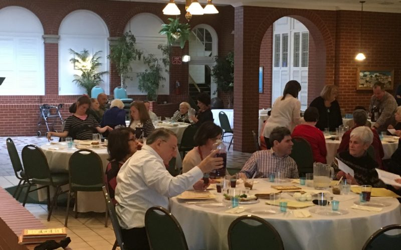 Holiday celebration. Groups of people at tables